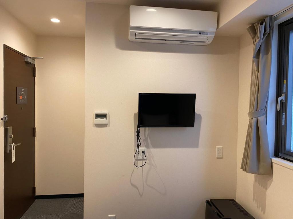 TV a/nebo společenská místnost v ubytování Floral Hotel · SakaisuJi-Honmachi Osaka