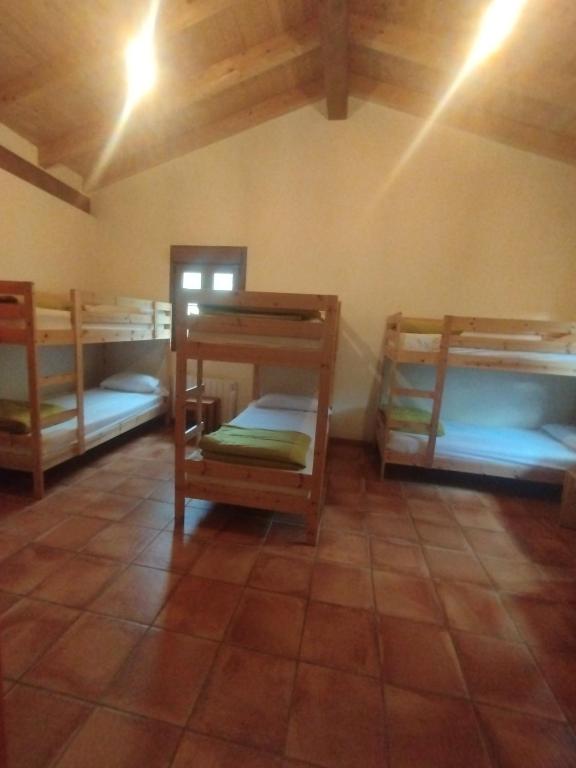 Postel nebo postele na pokoji v ubytování Albergue Usandi Auto Check-in