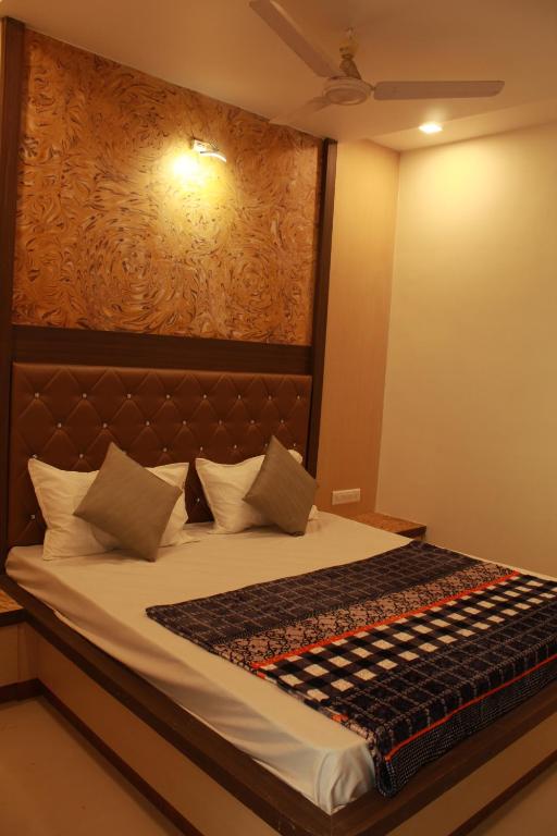 Postel nebo postele na pokoji v ubytování Hotel Skylark