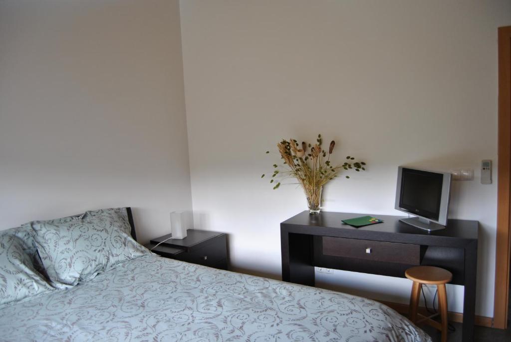 Uma cama ou camas num quarto em Casa dos Hospitalrios