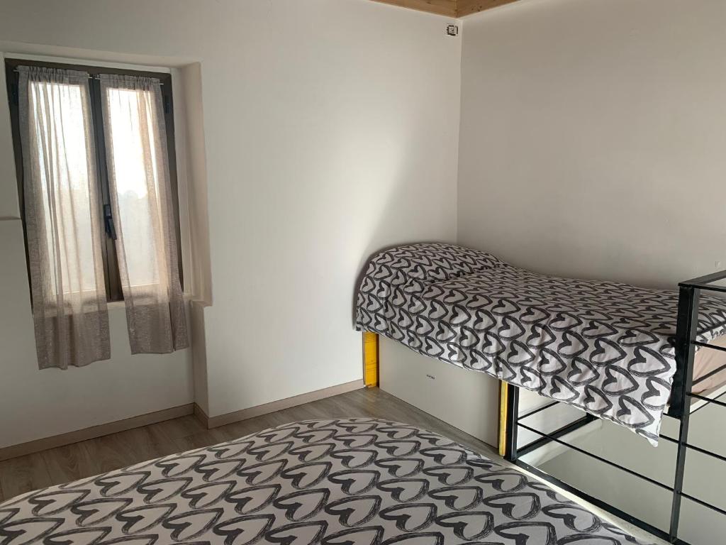 Postel nebo postele na pokoji v ubytování COSY LITTLE HOME