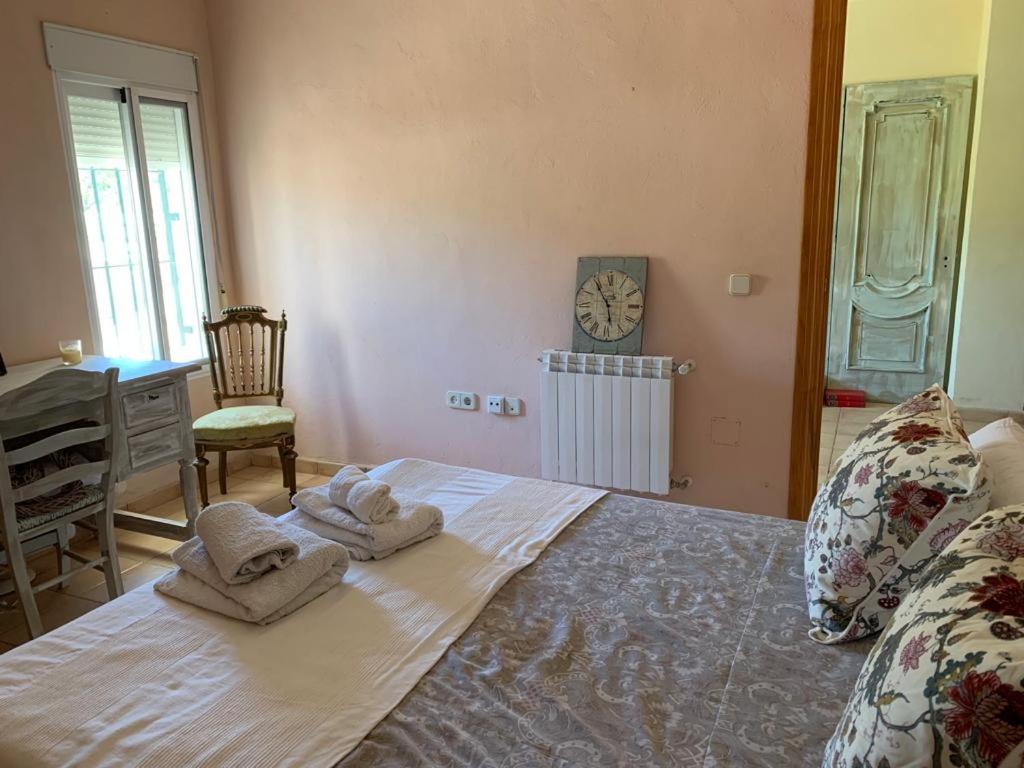 Postel nebo postele na pokoji v ubytování Complejo Rural Lo Arrabal