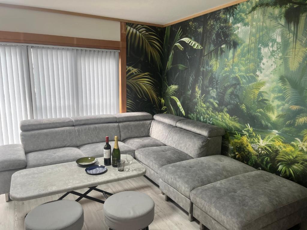 Posezení v ubytování Yokkaichi Guest House