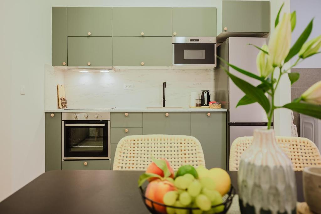 Η κουζίνα ή μικρή κουζίνα στο Stylish town centre apartment MariRoza