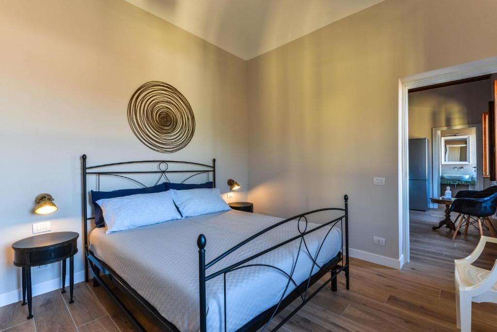 A bed or beds in a room at Casa Carol