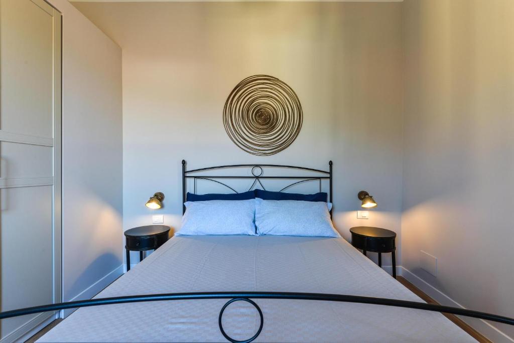 A bed or beds in a room at Casa Carol
