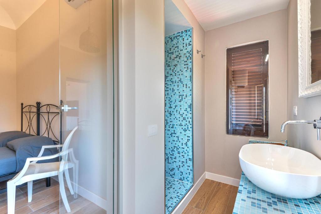 A bed or beds in a room at Casa Carol