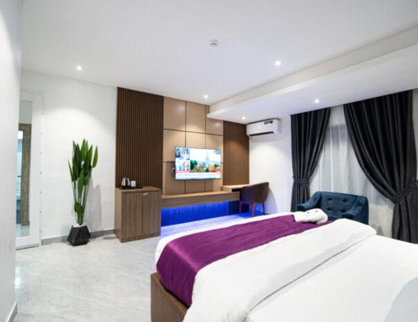 Postel nebo postele na pokoji v ubytování Nomase Hotel Limited