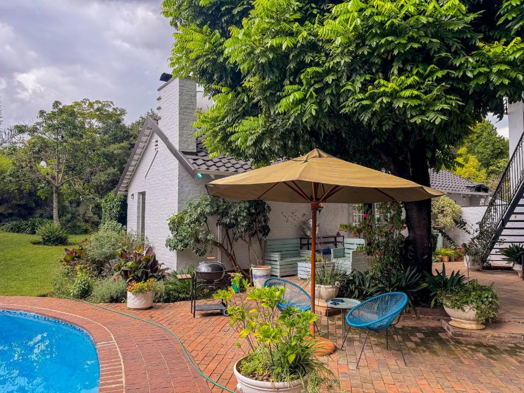 Garður fyrir utan Amoris Guesthouse Randburg II - Darrenwood