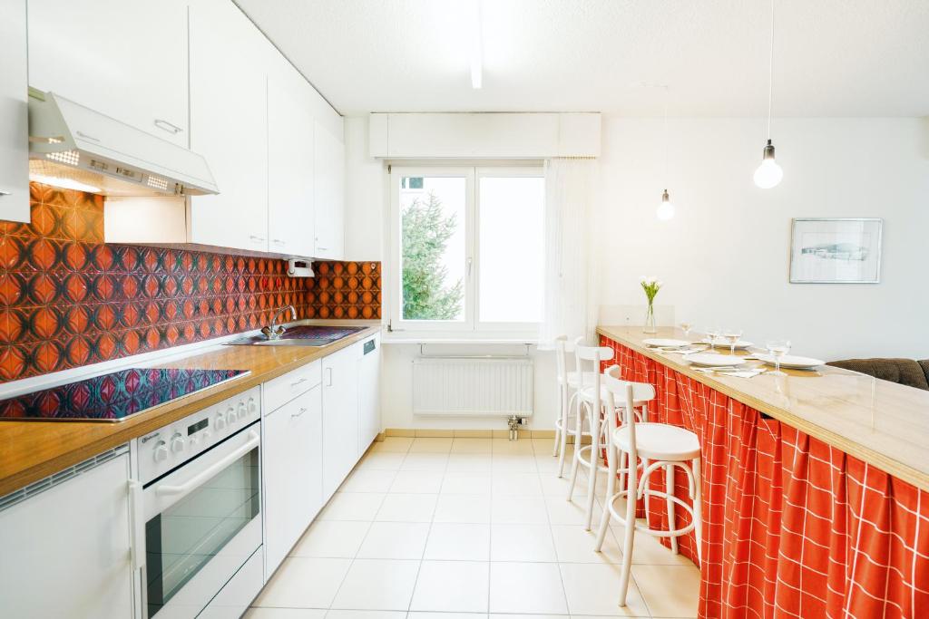 Kuchyň nebo kuchyňský kout v ubytování Apartment Morgensonne