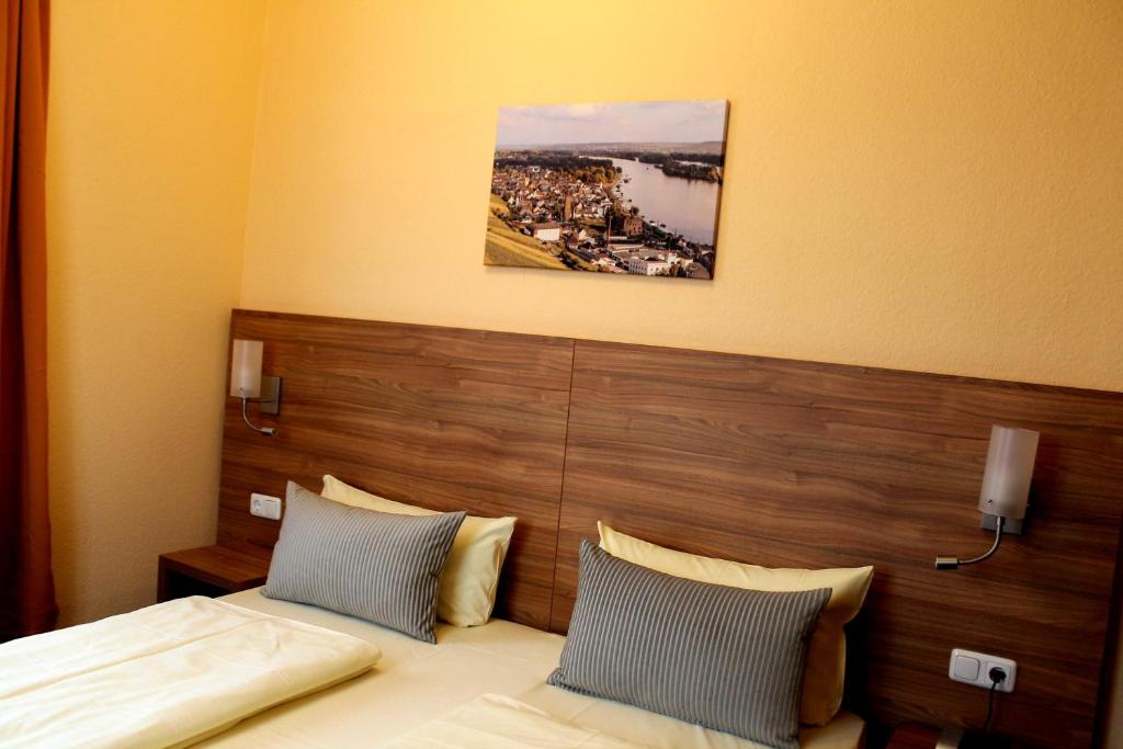 Postel nebo postele na pokoji v ubytování Zur Lindenau