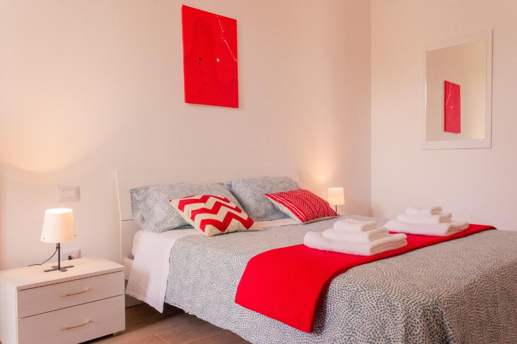 Postel nebo postele na pokoji v ubytování La Dolce Vita - Oasi di Relax - Parcheggio Gratuito a Conversano