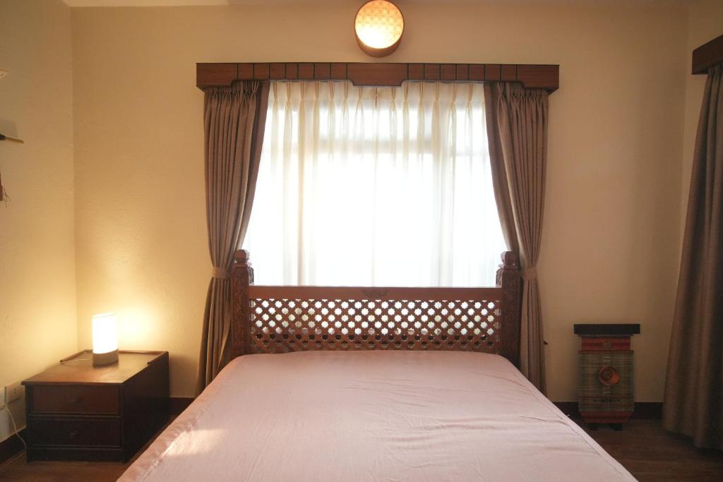 Ένα ή περισσότερα κρεβάτια σε δωμάτιο στο Heritage Suite with Terrace