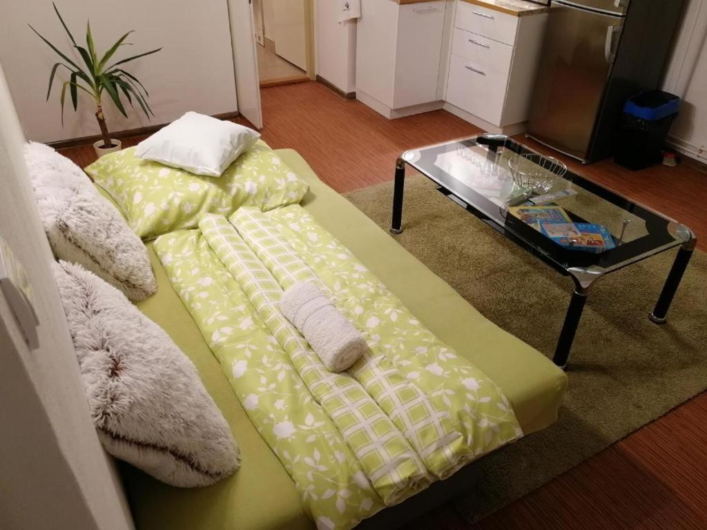 Postel nebo postele na pokoji v ubytování Ateliér sklep