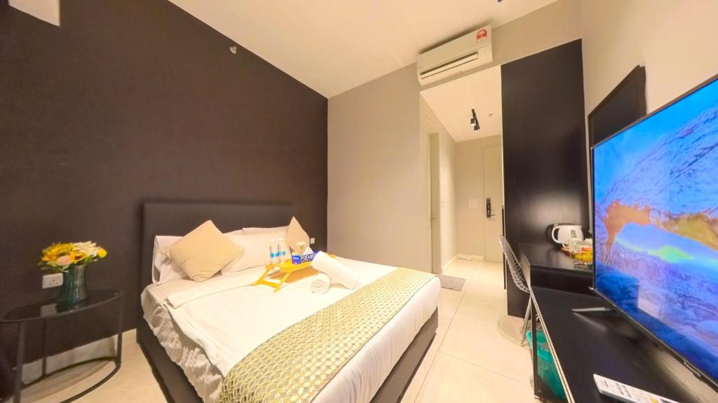 TV a/nebo společenská místnost v ubytování Axon Residence KLCC - HW HOME