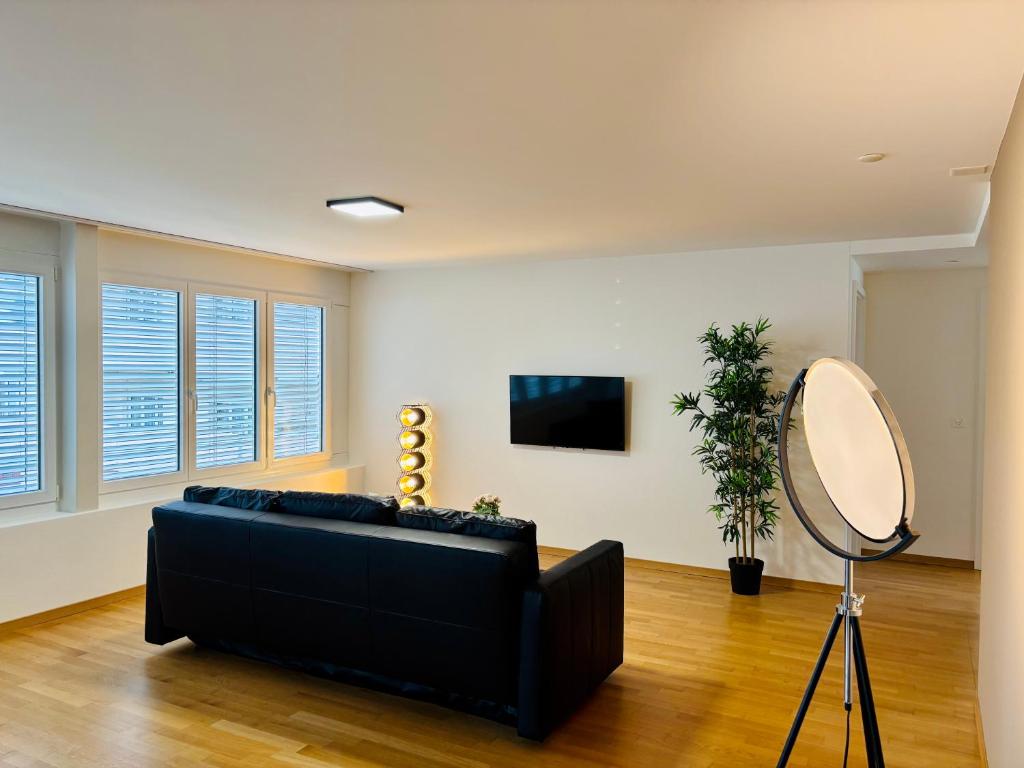 TV a/nebo společenská místnost v ubytování TONIGHT Apartments