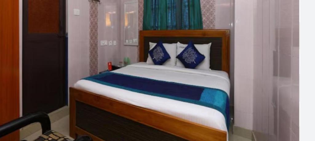Giường trong phòng chung tại SMS GRAND inn