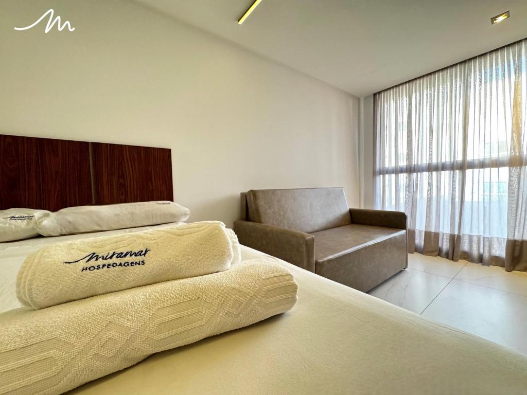 Ein Bett oder Betten in einem Zimmer der Unterkunft Unity - Cabo Branco