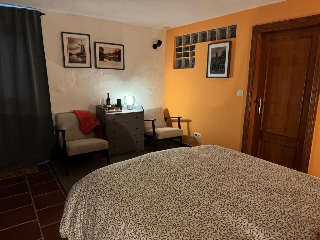 Postel nebo postele na pokoji v ubytování Cortijo Rosario