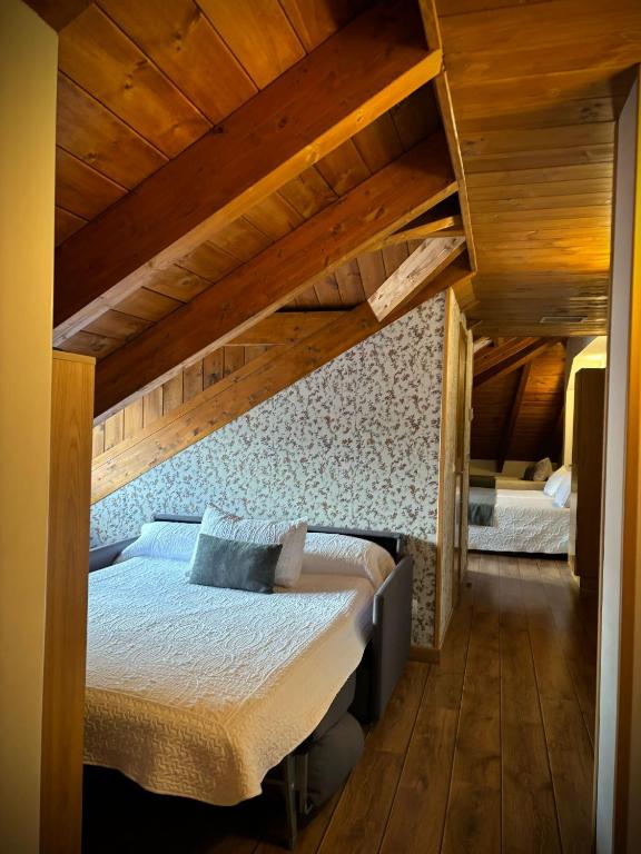 Postel nebo postele na pokoji v ubytování Hotel Molina Real