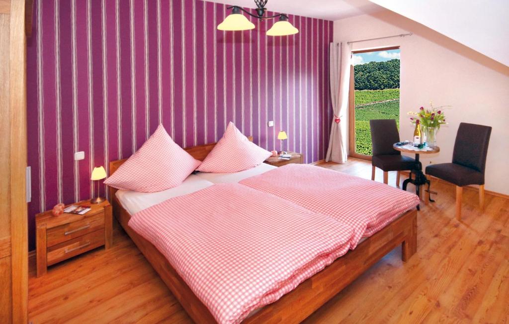 Postel nebo postele na pokoji v ubytování Gästezimmer Hans-Norbert Mack