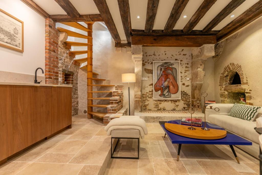 Χώρος καθιστικού στο L'Écrin sous le Château - Sauna et Raffinement - Classé 4 étoiles