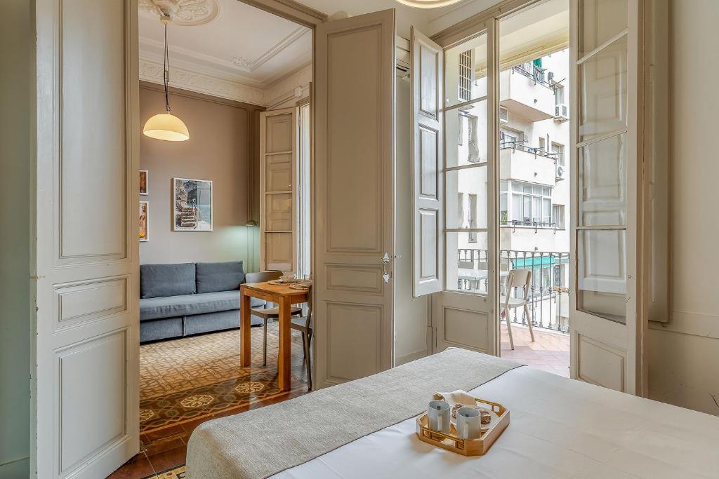 Postel nebo postele na pokoji v ubytování AB Bailen Apartments