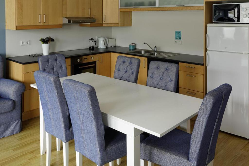 Kuchyň nebo kuchyňský kout v ubytování Hildibrand Apartment Hotel