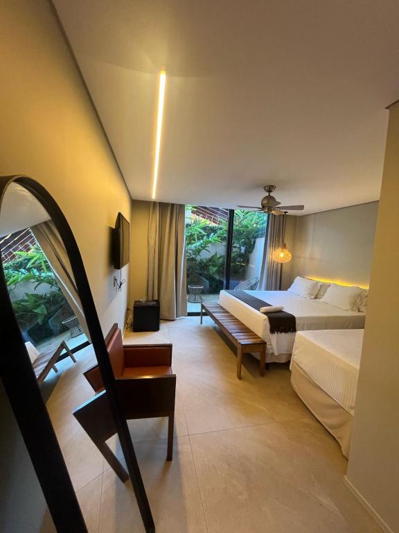 Cama ou camas em um quarto em Pousada Yamandu - Piscinas Aquecidas
