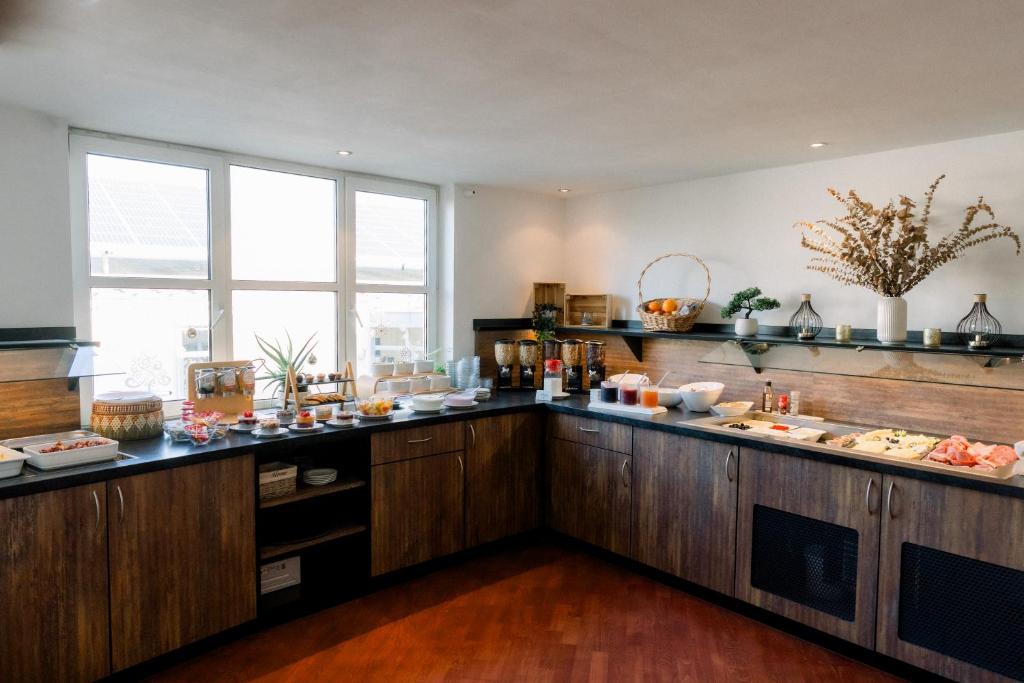 Kuchyň nebo kuchyňský kout v ubytování Trip Inn Hotel Dasing-Augsburg