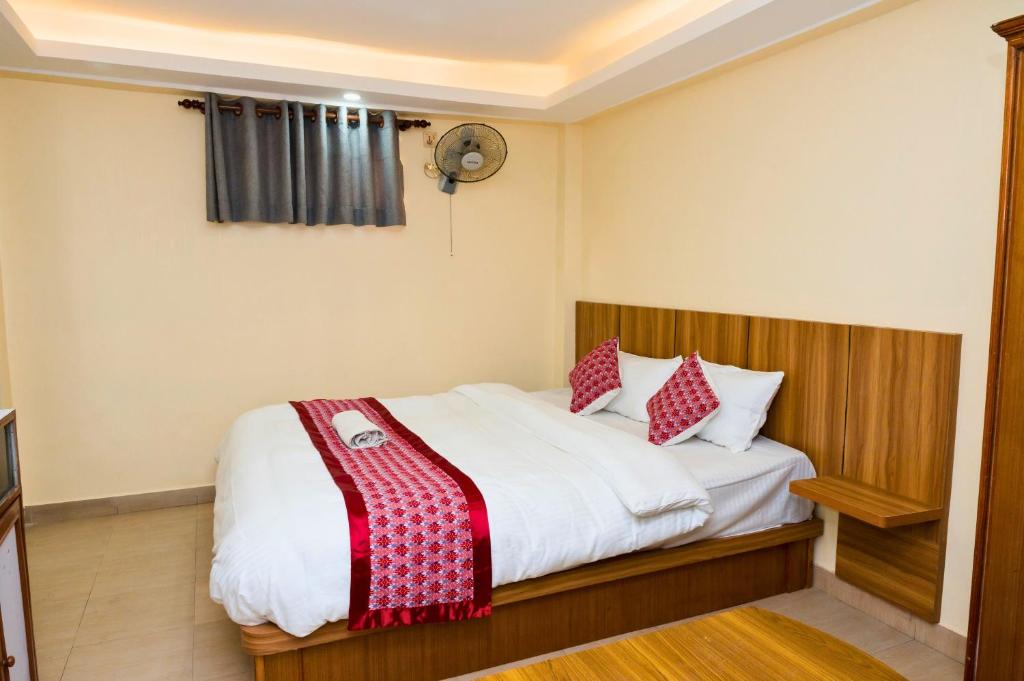 Postel nebo postele na pokoji v ubytování Rightway Hotel & Restaurant