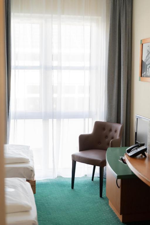 TV a/nebo společenská místnost v ubytování Trip Inn Hotel Dasing-Augsburg