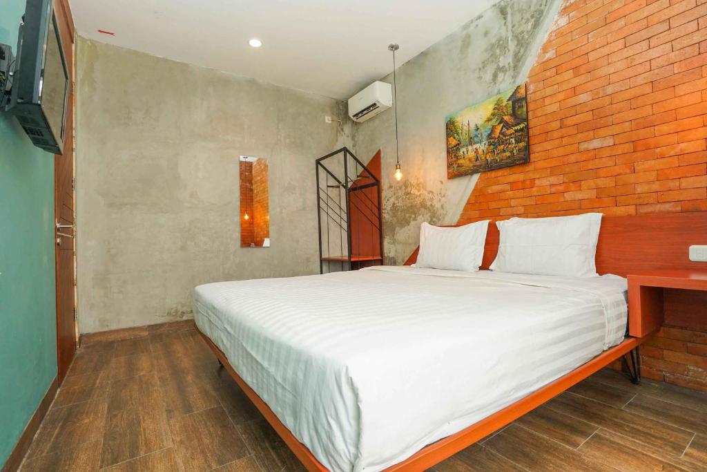 Voodi või voodid majutusasutuse Noesa Heritage toas