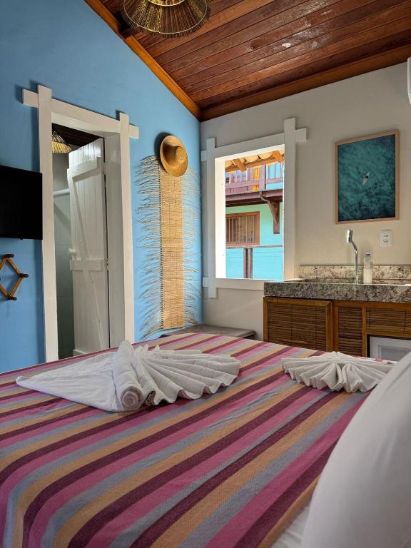 Postel nebo postele na pokoji v ubytování Blue Ocean Flats