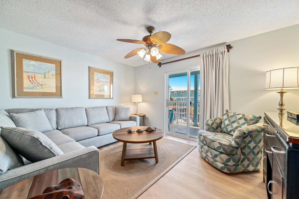 a living room with a couch and a table at Sundial Unit D1 in Gulf Shores