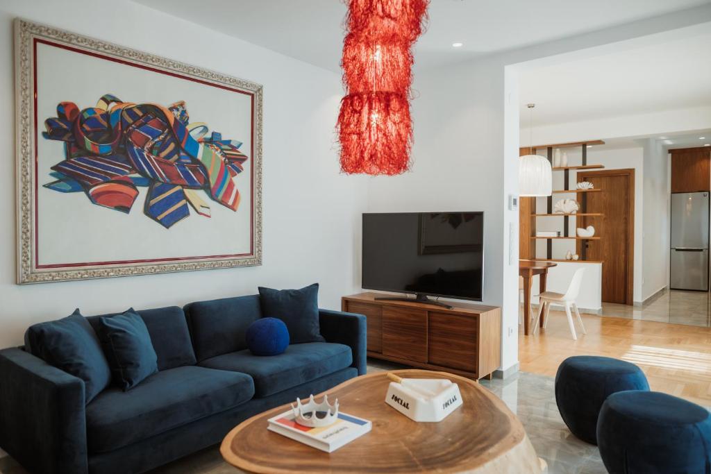 TV a/nebo společenská místnost v ubytování iKu Urban Apartment
