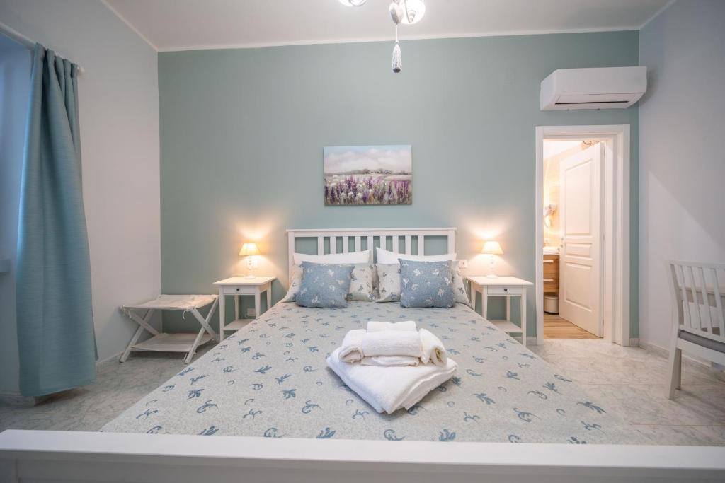 Postel nebo postele na pokoji v ubytování Masseria Agata