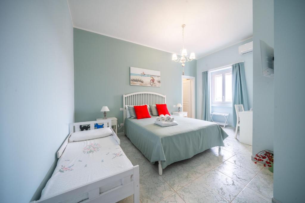 Postel nebo postele na pokoji v ubytování Masseria Agata