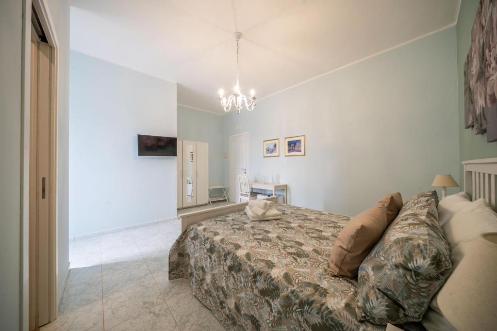 Postel nebo postele na pokoji v ubytování Masseria Agata