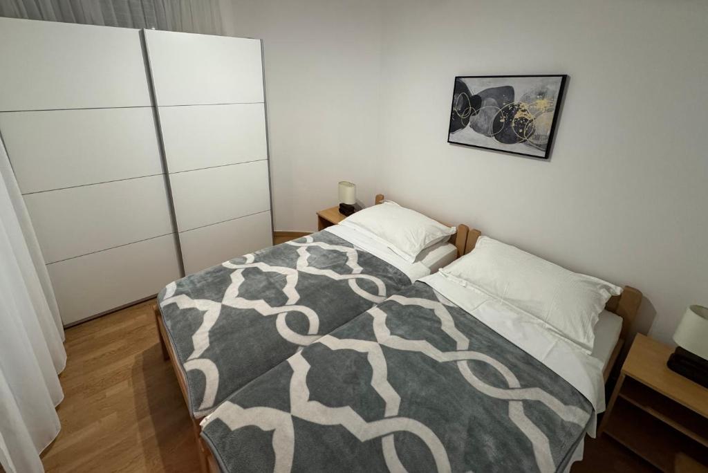 Postel nebo postele na pokoji v ubytování Apartment Pirun