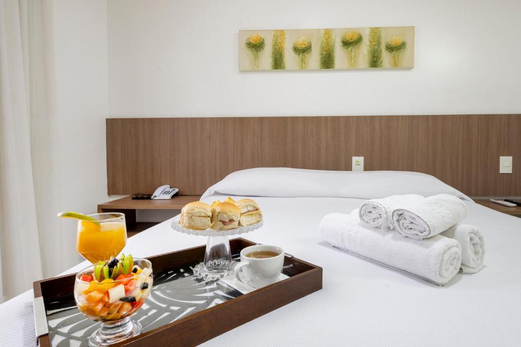 Cama ou camas em um quarto em Villa Park Hotel