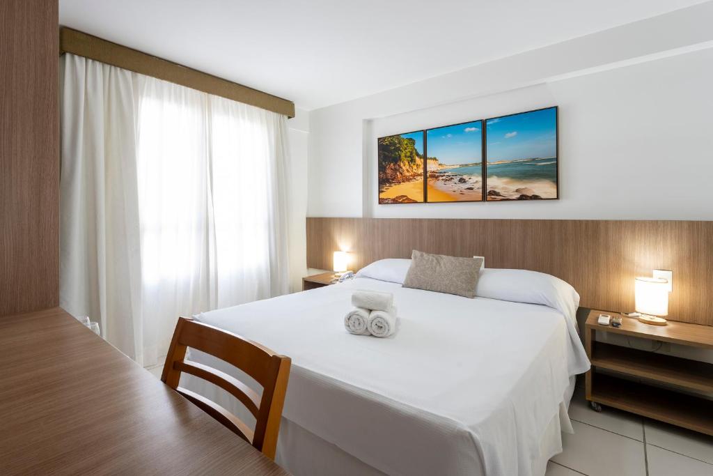 Cama ou camas em um quarto em Villa Park Hotel