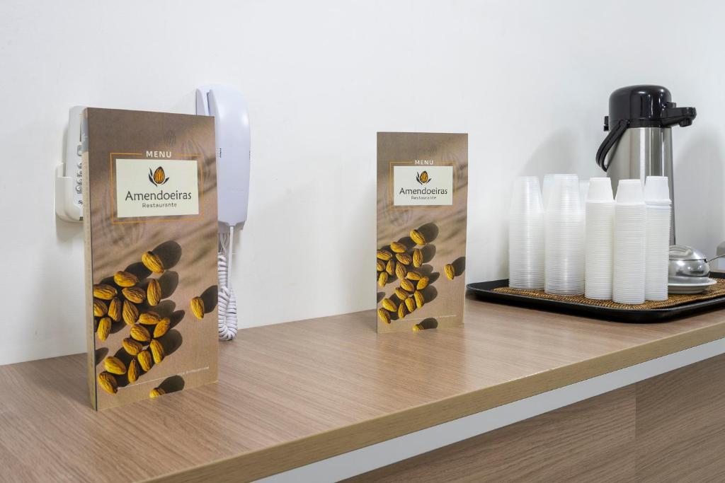 Comodidades para preparar café e chá em Villa Park Hotel