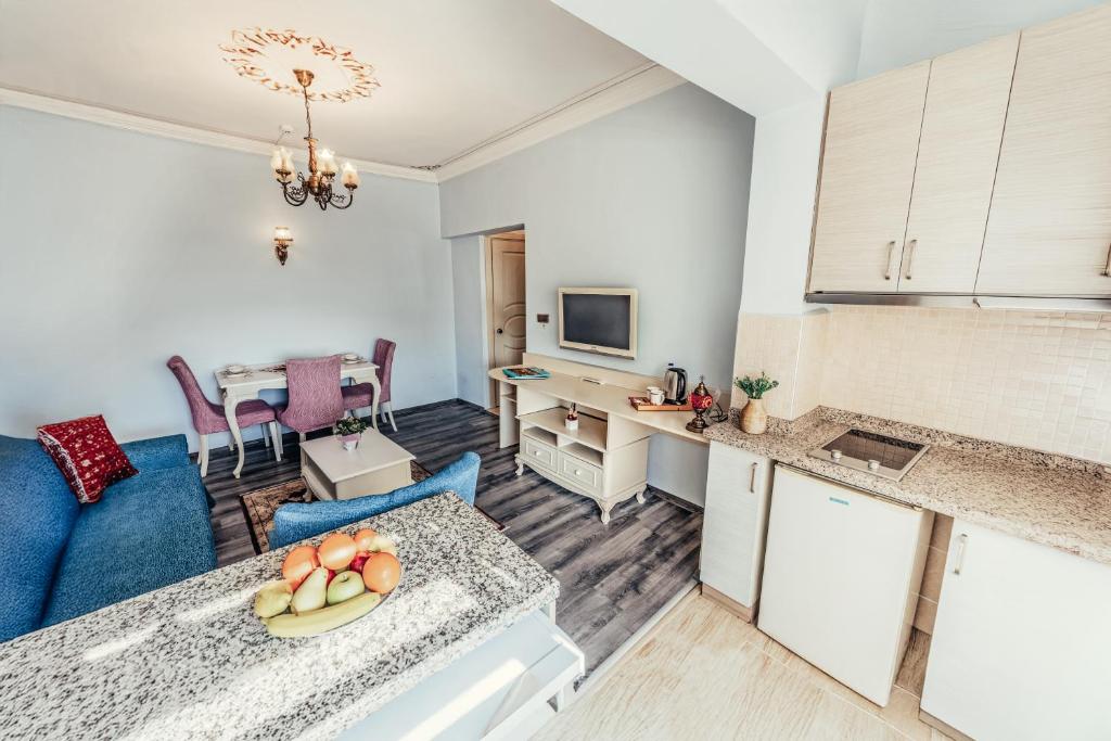 Kuchyň nebo kuchyňský kout v ubytování Olive Garden Apart