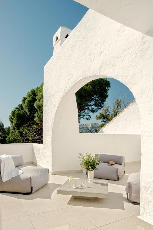 Posedenie v ubytovaní Anfitrión Villas & Suites