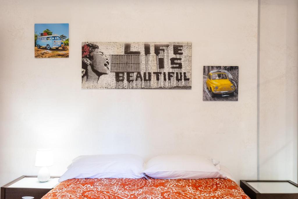 Łóżko lub łóżka w pokoju w obiekcie Casa Vacanze La Casetta