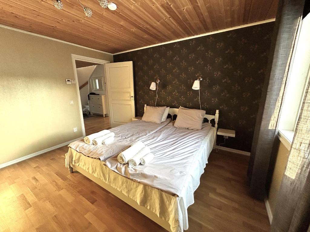 Postel nebo postele na pokoji v ubytování Sjöviken Härnösand