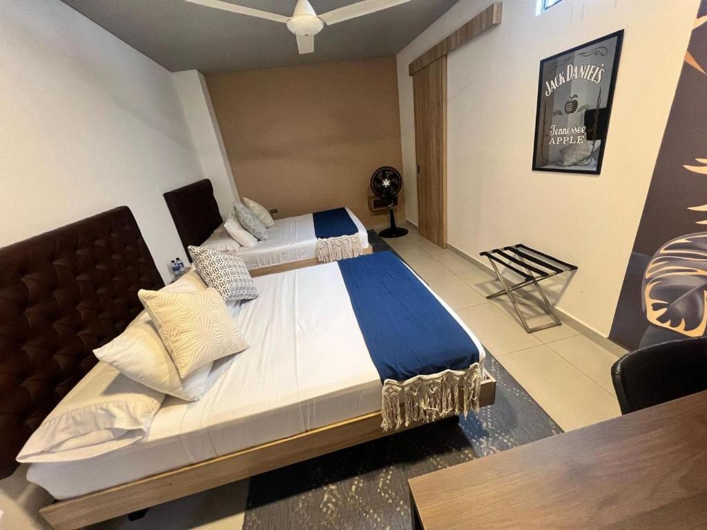 Postel nebo postele na pokoji v ubytování Star AV 37 HOTEL