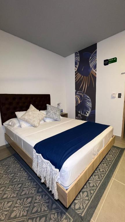 Postel nebo postele na pokoji v ubytování Star AV 37 HOTEL