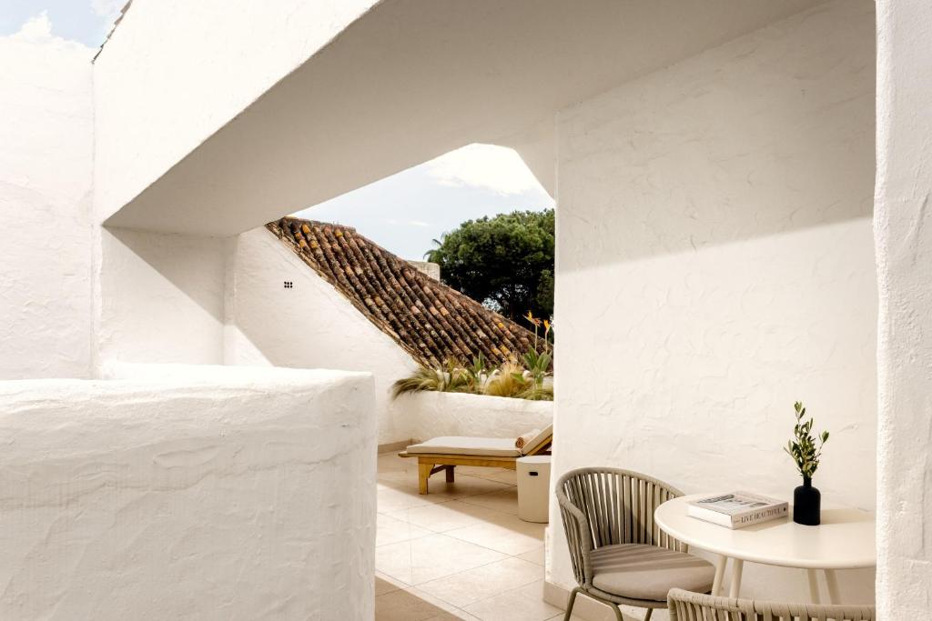 Posedenie v ubytovaní Anfitrión Villas & Suites